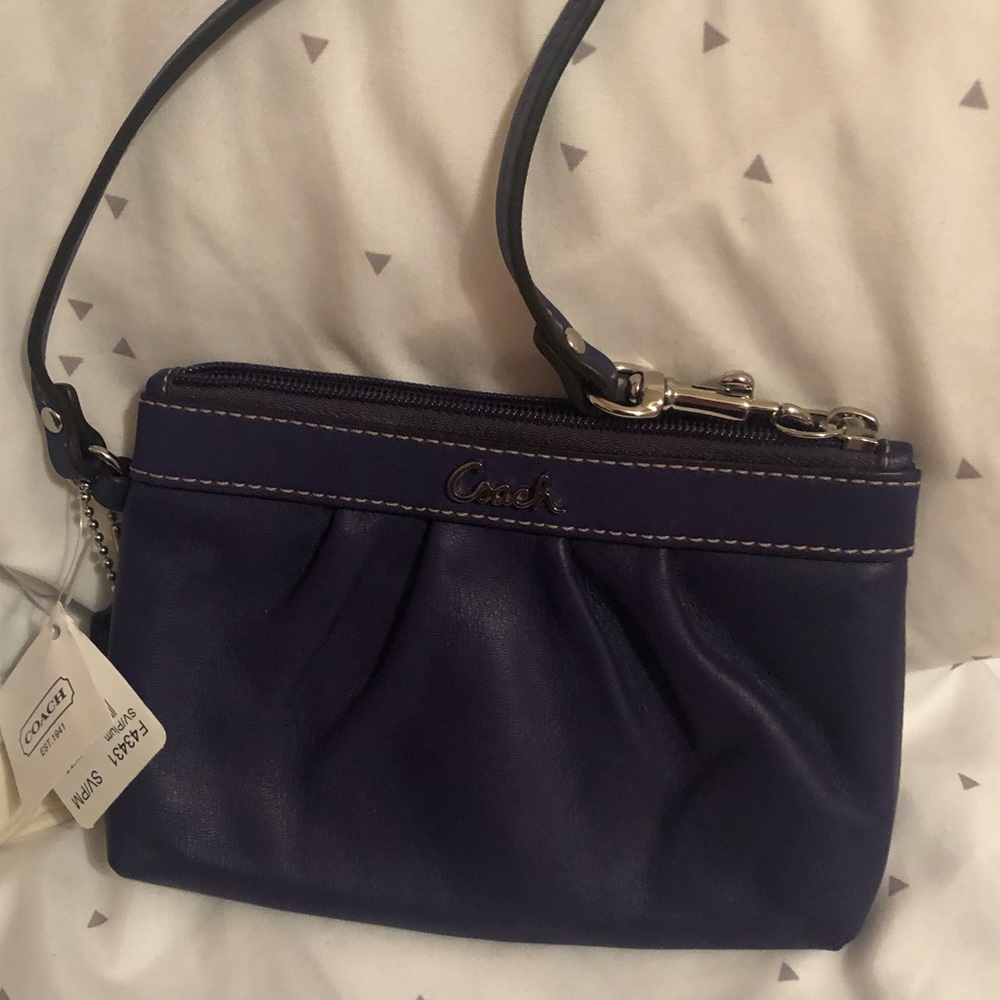 Purple Coach wristlet